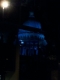 reflected in a building on Capitol Square